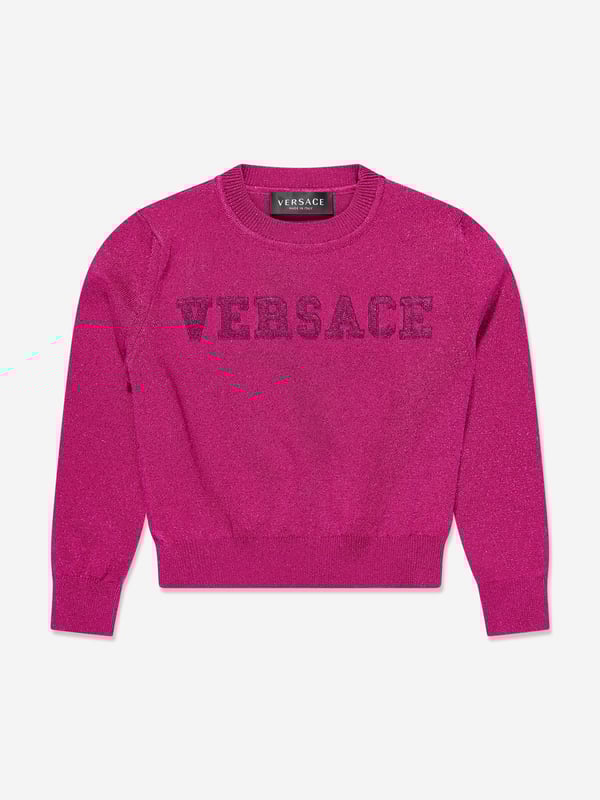 Introducing Versace's Girls Logo Knitted Sweater, a trendy and luxurious touch for your little one's wardrobe. Here are the top features: Italian Craftsmanship: Expertly crafted in Italy, signifying exceptional quality and longevity.Designer appeal: The iconic Versace logo print injects fun and high-fashion flair, turning this staple into a statement piece.Comfort Maximized: Fabricated from superior fabrics, assures a soft, cosy and breathable wear for all-day comfort. Updated Look: Amplify your girl's fashion statement with the chic Pink colour of this essential Versace sweater. Order today for a stylish, standout look.