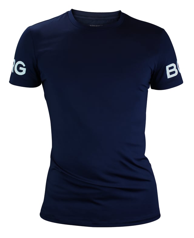 Get ready for your next run with the Björn Borg Men’s High Performance T-Shirt. A high quality performance t-shirt made from breathable material. Ideal for all other types of exercise.This short sleeve T-shirt is made from a breathable material that will keep you comfortable and dry as you move. It comes in a regular fit with a round neck, a longer length designed to include overhead exercises, and a longer back for extra coverage, ideal for running or other sports.With a higher armhole construction for optimal movement and the iconic Borg logo on the chest gives this t-shirt a stylish twist that will make it an instant favourite in your wardrobe. It also comes in 3 classic colours: Black, White & Peacoat (Navy).The Björn Borg Short Sleeve T-shirt is a high-performance tee made from soft 90% recycled polyester stretch quality fabric. The material is also quick drying so that you don’t have to worry about sweat while you workout.This t-shirt is made from: 90% Polyester (Recycled), 10% Elastane and comes in 4 sizes: Small, Medium, Large & X-Large. It is a short sleeve length and is Machine Washable.Extra Product DetailsBjörn Borg Men’s T-ShirtShort Sleeve LengthIdeal For EverydaySuitable For SportsBreathable MaterialRegular Fit & Round NeckHigher Armhole ConstructionIconic Borg Logo On ArmQuick DryingInsert Panels Under ArmsComes In Black, White or Navy90% Recycled PolyesterAvailable In: S, M, L & XLMachine Washable