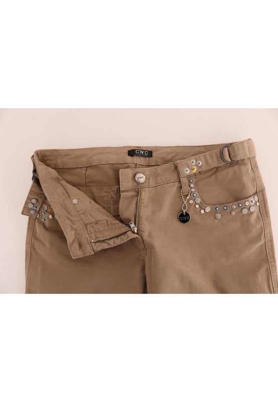 Precioso a estrenar con etiquetas.
  Vaqueros CoSTUME NATIONAL C'N'C 100% autenticos.
  Estilo de corte super ajustado.
  Color beige.
  Confeccionado con un 97 % de algodon y un 3 % de elastano.
  Cremallera y bragueta con boton.
  Detalles del logotipo.