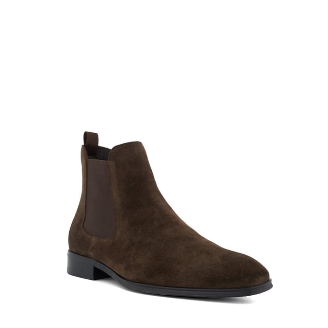 Dune Mens MANDATORY Chelsea Boots Mandatory Synonymous with Dune London, the Chelsea boot is a long-standing classic favoured for its transitional appeal. Signature style Mandatory perfectly blends a contemporary aesthetic with our iconic heritage. Crafted from the finest material and detailed with a quintessential elastic side gusset and grosgrain pull tab, this almond-toed silhouette has been set on a durable rubber outsole. Finished with tonal stitching, this timeless style will become a go-to dressing solution throughout the season.
