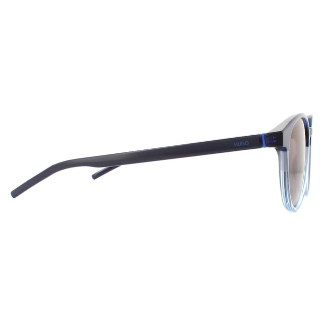 Las Gafas de Sol Hugo by Hugo Boss HG1127/S ZX9/XT Azul Mate Turquesa Azul Espejo son un estilo redondo contemporáneo fabricado en plástico hipoalergénico ligero. Las patillas delgadas están sutilmente marcadas con el logotipo de Hugo, al igual que el ángulo de la lente.