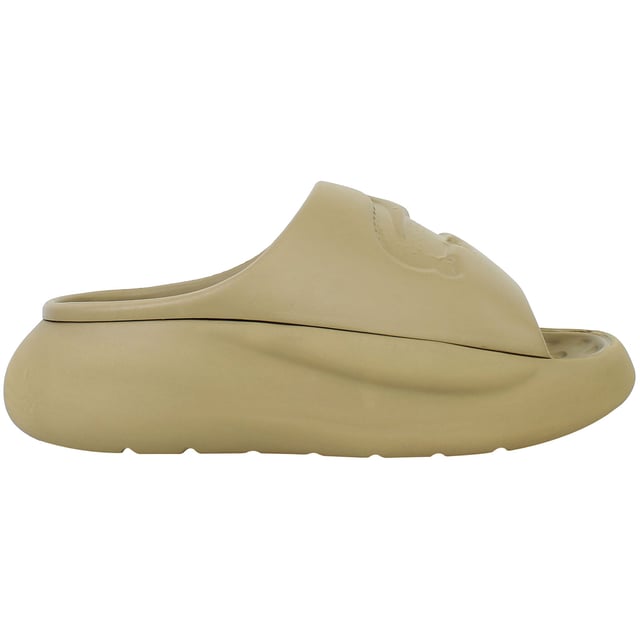 The Lacoste Serve Slide 3.0 223 1 CFA Women's Brown Sliders are a stylish and practical choice for casual wear, poolside lounging, or beach outings. With a sleek design and premium comfort, these sliders offer versatility and durability for everyday use.
Â 
Key Features:
Ergonomic Footbed: 

Contoured design provides superior comfort and support, ensuring a comfortable fit throughout the day.


Durable Synthetic Strap: 

Features the iconic Lacoste crocodile logo embossed for a stylish and recognizable touch.


Slip-On Design: 

Easy to wear, making them perfect for leisure or quick outings.


Textured Rubber Outsole: 

Ensures reliable grip and stability on various surfaces, including wet conditions.


Lightweight Construction: 

Reduces fatigue, making these sliders ideal for extended wear.


Water-Resistant Materials: 

Suitable for pool, shower, or beach environments, withstanding exposure to water.


Elegant Brown Colorway: 

A versatile and modern shade that complements casual and summer outfits.


Â 
The Lacoste Serve Slide 3.0 223 1 CFA Women's Brown Sliders combine iconic branding with everyday functionality, making them an excellent choice for stylish and comfortable footwear during relaxed occasions.