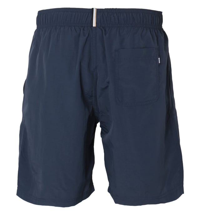Swim in style this season with BOSS bodywear. These sporty swim shorts are crafted from a quick drying nylon fabric with a mesh lining for extra support. Featuring an elasticated drawstring waist, twin side seam pockets and a rear welt pocket. Finished with a large BOSS logo embroidered to the left leg.\nRegular Fit, Quick Dry Nylon, Elasticated Drawstring Waist, Twin Side Seam Pockets, Rear Welt Pocket,