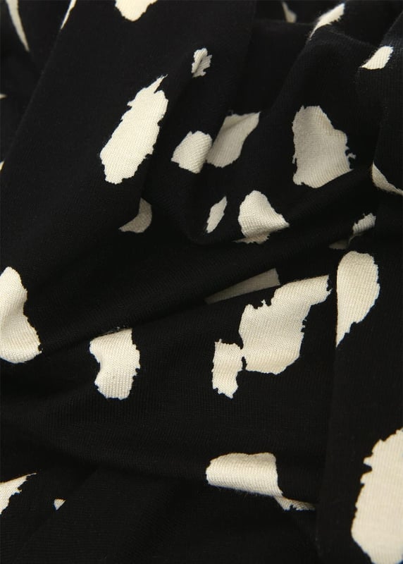 Discover timeless elegance with the Hobbs 'Alcott' Abstract Splash Dot Jersey Dress. Crafted from soft jersey fabric, this dress features a classic stand neck, long sleeves, and a chic black and cream print, making it the perfect choice for both casual and dressier occasions.