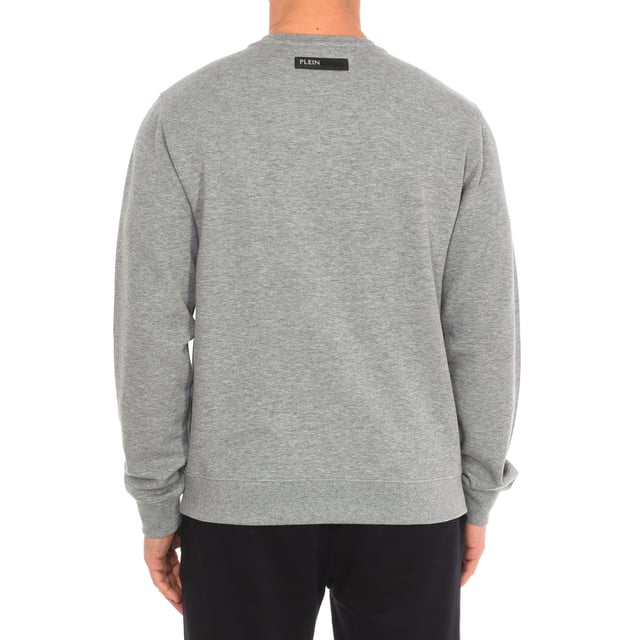 Sweatshirt Plein Sport.
 Ribbed crew neck.
 Brand print on the front.
 Ribbed cuffs and waistband.
 Seams seen in tone.
 Composition: 52% Cotton, 48% Polyester
 Care:
Wash at maximum temperature 30º.
 Iron at medium temperature.
 Do not use bleach.
 Do not use dryer.
 Do not dry clean.