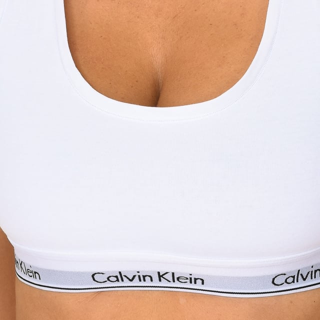 Calvin Klein Top and Briefs Set.
 White color
 Designed to guarantee comfort and softness.
 Elastic rubber, with the name of the brand embroidered consecutively.
 Inner lining.
 Seam seen to tone.

 Composition: 53% Cotton, 35% Modal, 12% Elastane

 Washing instructions:
 - Wash maximum at 40ºC.
 - Iron at medium temperature, max. 110 ° C.
 - Does not allow to use tumble dryer.
 - Do not use bleach.
 - It does not support dry cleaning.