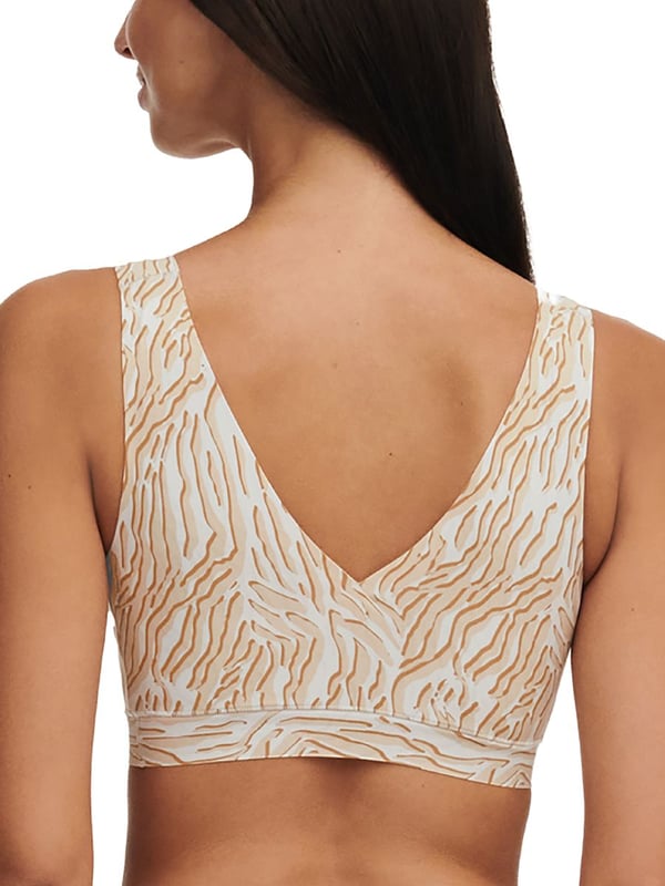 Chantelle SoftStretch Padded Bralette Top. With wide straps, V-shaped neckline and non-removable pads. Seamless construction and fully lined. Product is made of Nylon, Elastane, Polyester and is recommended hand-wash only.