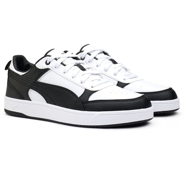 Lace Up And Power Your Stride With The Puma Dribble Court Trainers. These Retro-inspired Kicks Feature A Synthetic Leather Upper With The Iconic Puma Branding. The Padded Collar And Comfort Insole Cushion Your Every Step, While The Grippy Rubber Outsole Handles The Blacktop Like A Pro. Whether Playing A Pick-up Game Or Just Looking The Part, These Classic Black And White Trainers Have You Dribbling In Style.