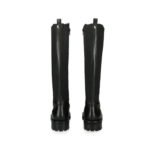 The Kurt Geiger South 50/50 boot is crafted in black leather with shine. The back of the ankle has an elongated elastic panel and inner side zip for maximum comfort.