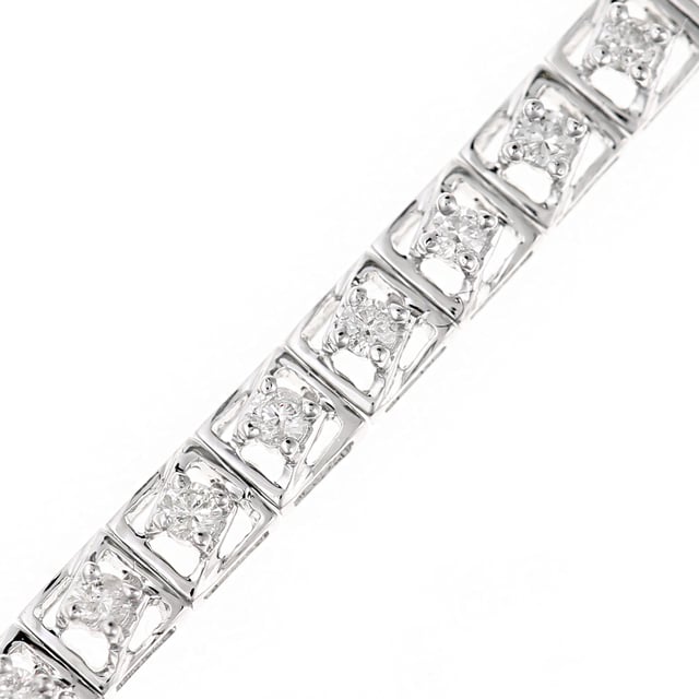 9K (375) witgoud: 1,06 gram; # Diamant: 1ct