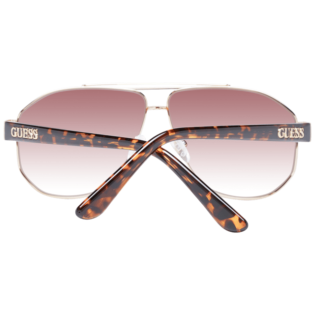 Gender: Women
Main color: Gold
Extra: No extra
Frame color: Gold
Frame material: Metal
Lenses color: Brown
Lenses material: Plastic
Filter category: 3
Style: Aviator
Lenses effect: Gradient
Protection: 100% UVA & UVB
Size: 61-10-145
Lenses width: 61
Lenses height: 51
Bridge width: 10
Frame width: 140
Temples length: 145
Spring hinge: No
Shipment includes: Branded case
Rim style: Full-Rim