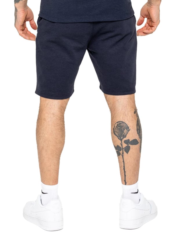 Enzo Mens Casual Stretch Shorts offer comfort and convenience with 2 side & 2 back pockets, elastic waistband & adjustable drawstring, and front pin tuck seam detail for added style and functionality. Perfect for errands or lounging with a practical and stylish design.