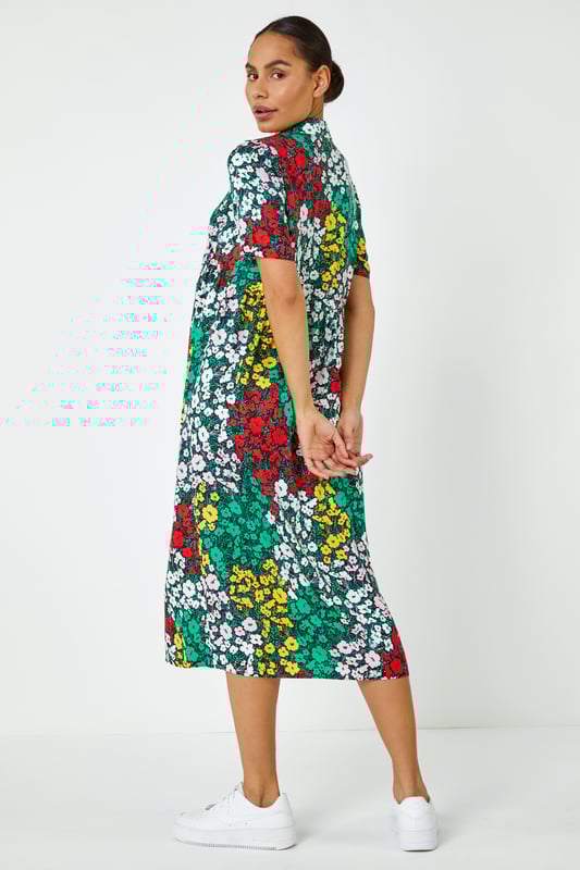 Ditsy Floral Midi Shirt Dress from Roman. We just can't get over this floral print woven dress, cut to a timeless silhouette its relaxed collared neckline and colourful hues give it a feminine and sophisticated feel. Made from a lightweight fabric, button down front with short sleeves, this style is perfect for summer and can be worn with a cropped denim jacket and sandals for the ultimate post-lockdown look.