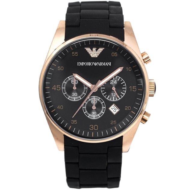 Japanese Made Quartz Chronograph Movement. 38mm Rose Gold PVD Plated Stainless Steel Case. Solid Caseback. Black Dial. Luminous Stainless Steel Hands. Printed Indexes. Date between 4 and 5 O'Clock. 20mm Black Silicone Coated Stainless Steel Bracelet with Stainless Steel Butterfly Clasp. Water Resistant to 50 Meters 5ATM. This watch is and comes with the correct Box and Paperwork.