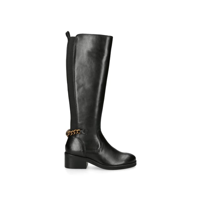 KGL Cheslea Rider from Kurt Geiger London is a knee high boot with a black leather upper. There is a gold chain at the back featuring a brass eagle head.