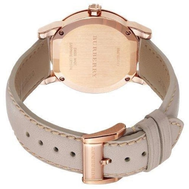 Specification Details Brand Burberry Model BU9014 Barcode Number 4051432468520 Gender Women's Case Diameter 38 mm Case Material Stainless Steel Case Colour Rose Gold Dial Colour Tan Check Stamped Band Material Leather Band Colour Beige Movement Quartz Chronograph No Water Resistance 5 ATM