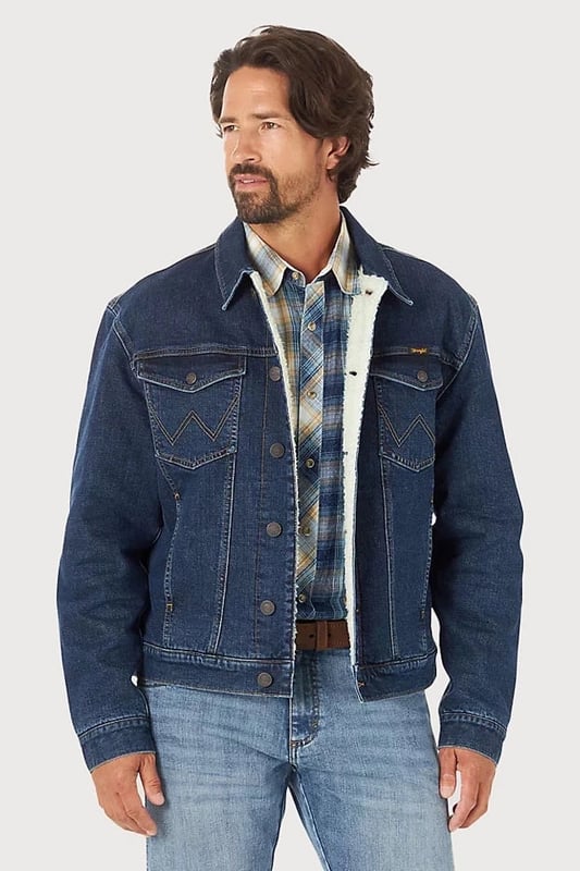 Ramp up your style with this Western Denim Jacket. Created with enhanced denim specifically crafted to have superior stretch recovery, meaning it will hold shape throughout the day. Western details spade chest pockets with W stitching, flap pockets with snaps, welt front pockets are infused with a soft, sherpa lining through the entire body to make this jacket both fashionable and functional.

Sherpa Lined  Denim Fabric
 
100% Cotton Outer, Polyester Borg Lining
 
Regular Collar
   
27" Shoulder to Hem
    
Sizing: As expected
 
Fit: Boxy
  

These are end of line ex Wrangler and may not be in original packaging