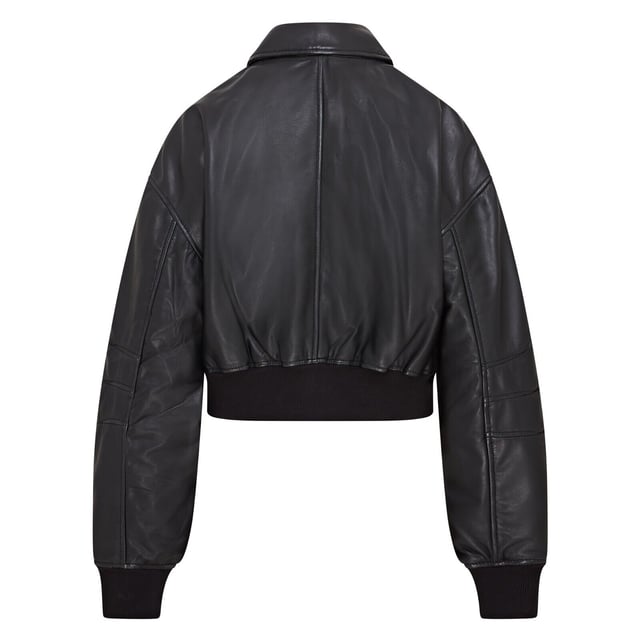 Elevate your style with this effortlessly cool, black cropped leather bomber jacket. Designed for a relaxed, oversized boyfriend look, this piece is crafted from soft sheep nappa leather, featuring expertly aged seams and pockets for a vintage appeal. A robust YKK zipper leads to a classic shirt-style collar, while the rib-knit hem and cuffs ensure a snug fit and warmth. With two waist pockets and a zipped sleeve pocket, plus a luxurious satin lining with a leather-trimmed interior pocket, this jacket blends functionality with edgy sophistication. Soft, aged sheep nappa leather, Oversized fit, Chunky YKK zipper, Rib-knit hem and cuffs, Satin-lined with leather-trimmed interior pocket