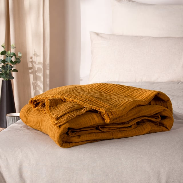 In muted earthy tones and solidly crafted from super soft, woven blends of yarn, the Morni throw instantly creates a warm, understated style for your soft furnishings. The design is complimented by tassel fringing on two sides and is ideal if you love to build up textures within a modern, neutral interior.