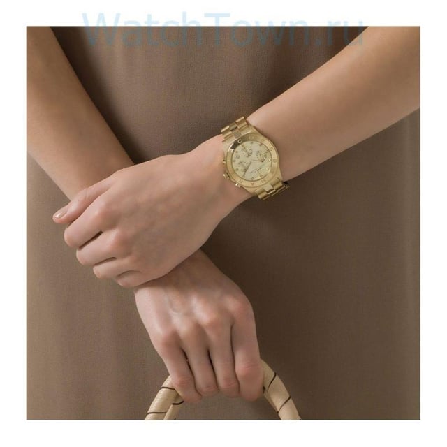 Specification Details Brand Marc by Marc Jacobs Model MBM3101 Barcode Number 691464759391 Gender Women's Case Diameter 40 mm Case Material Gold-tone Stainless Steel Case Colour Gold Dial Colour Gold Band Material Stainless Steel Band Colour Gold-tone Movement Quartz Chronograph Yes Water Resistance 5 ATM