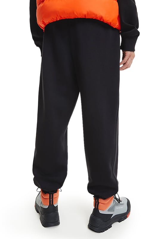 Pantalones deportivos, cintura elástica con cordones, elástico en los tobillos, 2 bolsillos, bordado, detalles en contraste, logo de algodón.