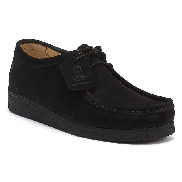 The suede shoes from TOWER feature a classic moccasin-inspired silhouette with two-eyelet lace up fastening and a simple crepe rubber sole in tonal black.