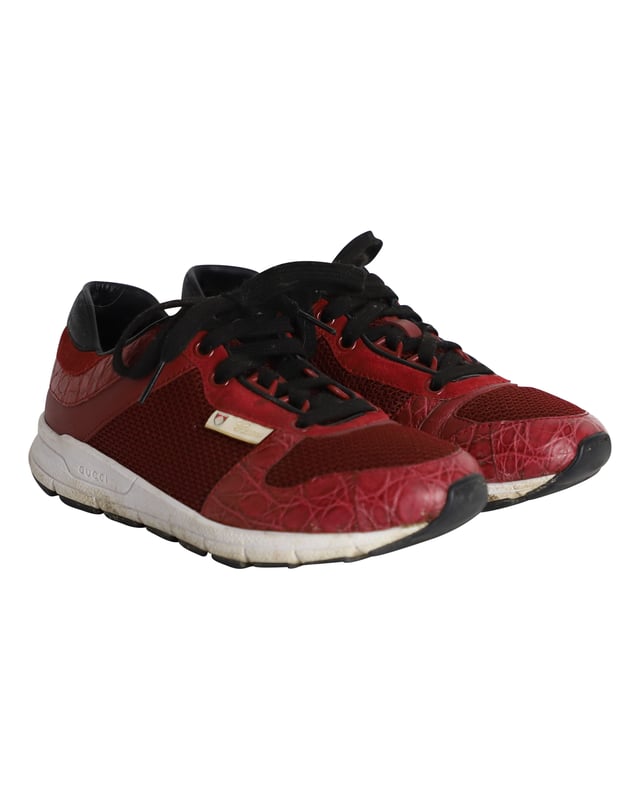 VINTAGE, RRP AS NEW
A vintage Gucci piece with a timeless design, these low-top sneakers feature crocodile-embossed leather panels, a lace-up front fastening, and a bold red hue, making them a hit for any collector. A great everyday sneakers to mix and match with your casual outfits.

Gucci Vintage Croco-Embossed Low-Top Sneakers in Red Leather and Mesh
Condition: Very good
Sign of wear: Moderate wear on the soles, moderate wear on the insoles, stains on the midsoles
Material: Leather and mesh
Color: Red
Size: IT35 / UK2 / US5
SKU: 291291