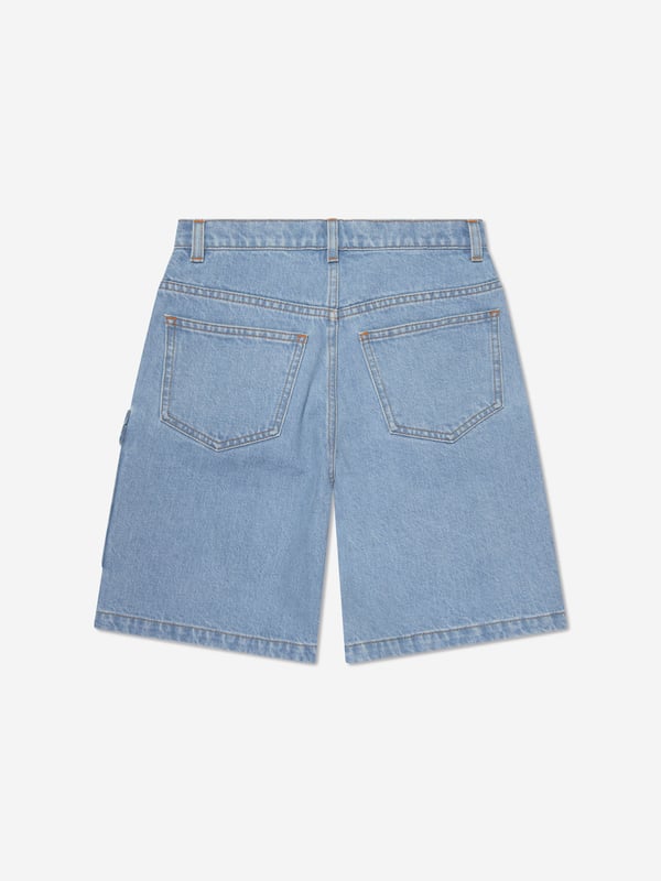 Introducing the Fendi Boys Big Pocket Logo Denim Shorts in captivating Blue! Tailor-made for your little man's chic wardrobe, this piece blends fashion with functionality. Highlighting features include:  Italian Craftsmanship: Exemplifying Fendi's unparalleled quality and precision, expertly produced in Italy for unrivalled finish and longevity. Signature Logo Print: The Fendi logo print provides a trendy, high-fashion edge, transforming these shorts into an eye-catching conversation piece. Ultimate Comfort: Manufactured with premium materials to assure softness and comfort, ideal for your boy's day-to-day exploits.Revamp your youngster's wardrobe with these signature Blue Logo Denim Shorts from Fendi. Order now, and let your young one exhibit exceptional style!