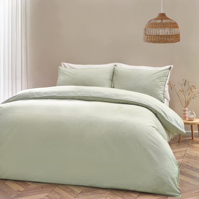 Minimalist yet modern, the Heaton Stripe duvet cover set is ideal for those who adore the relaxed-living aesthetic. Featuring a subtly textured, striped design, this 100% tumbled cotton bedding is complete with twin-needle stitch edging. Crafted from ultra-cosy, breathable fabric, this duvet set will become much softer with every wash! This product is certified by OEKO-TEX® MADE IN GREEN showing it has been sustainably made.
