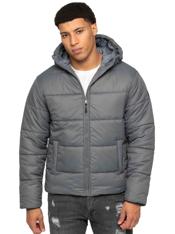 Introducing the Men's Hooded Puffer Jacket—a perfect blend of warmth and style. Featuring a high-neck design and long sleeves. The front zip-up closure offers a sleek and modern look, while the two spacious zipped side pockets provide practicality for carrying essentials. Ribbed cuffs and drawcord hem with adjustable toggle to add to the secure fit, enhancing overall comfort. Crafted from durable materials, this puffer jacket is both functional and stylish, ideal for everyday wear
•	Hooded Puffer Jacket
•	High-neck design
•	Ribbed cuffs
•	Drawcord hem with adjustable toggle