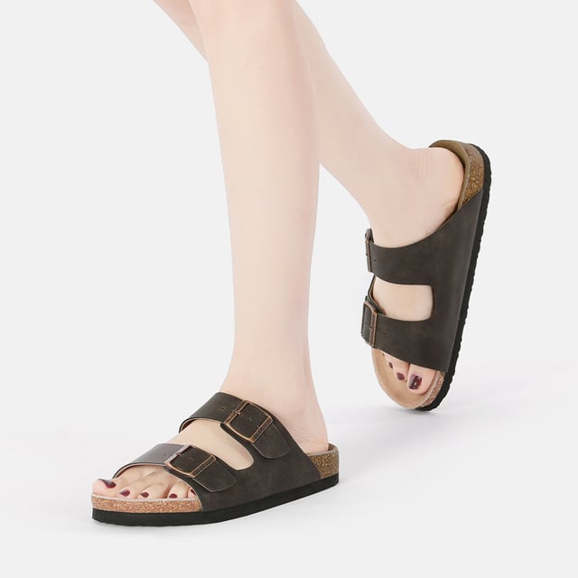 Toss your beach bag over your shoulder and slide into our Mallard Slides for all-day comfort. With their double straps, your feet will stay happy from sunrise to sunset. Plus, these shoes come packed with extra comfort and safety features, including adjustable buckle straps, a cushioned cork sole, and a waffle-like pattern for enhanced grip on wet surfaces.

Product No. EAU5001

Description: - Leather Upper - Cowhide Midsole - EVA Sole