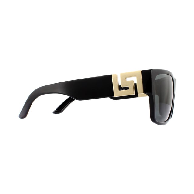 Versace Sunglasses VE4296 GB1/87 Black Grey are a bold square shape that features a sculpted metal Versace Greca logo at the hinges. The large metal logo contrasts perfectly against the acetate frame and creates an edgy look.