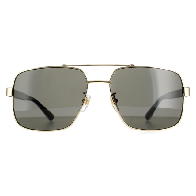 Gucci Square Herren Gold Schwarz Grau GG0529S Gucci ist eine quadratische Pilotenbrille mit dem typischen Doppelsteg-Look und schlanken Acetat-Bügeln mit dem Gucci-Logo und den Farbstreifen der Marke