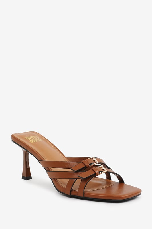Wheres That From Womens 'Torigh' Cross Over Buckle Details Strap Heel Step up your style with these Torigh Cross Over Buckle Details Strap Heel. Perfect for casual outings or dressy events, these sandals combine modern elegance with lasting comfort, making them a must-have addition to your wardrobe.
Key Features:
Durable Construction: Crafted with high-quality faux leather, these sandals are designed to last. The sturdy heel and durable straps provide reliable support, ensuring they can withstand regular wear without compromising style.
Chic Design: The multi-strap design with subtle metallic accents exudes elegance and sophistication. The square toe and slender heel add a modern, fashion-forward touch that enhances their timeless appeal.
Comfortable Fit: Featuring a padded insole and a balanced heel height, these sandals provide all-day comfort without sacrificing style. The open design ensures breathability and ease of wear, making them perfect for any occasion.
Specifications:
o Material: High-quality faux leather
o Heel Type: Slender heel
o Closure: Slip-on design for convenience
Elevate your footwear collection with these Torigh Cross Over Buckle Details Strap Heel. Combining chic design, durable construction, and superior comfort, they are perfect for making a statement wherever you go!