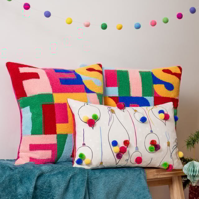 Get into a 'Christmassy' mood with this vibrant knitted loop tufted cushion. Woven in a range of fabulous techno colours and paired with a fuchsia pink velvet reverse; This unique design is the perfect addition for those who love all things colour!  Size: 43 x 43cm
