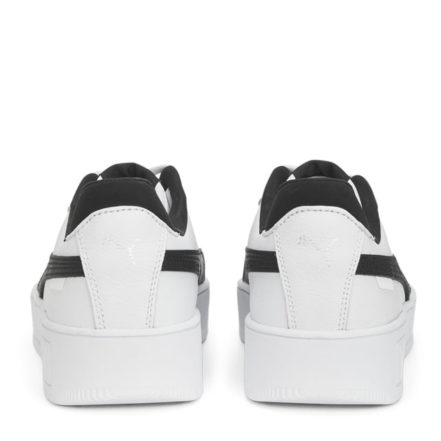PRODUCT STORY: Streetwear-inspired design and a slightly elevated platform make these Carina's perfect for everyday outfits. FEATURES & BENEFITS: SOFTFOAM+: Step-in comfort sockliner designed to provide soft cushioning thanks to its extra thick heel; Recycled Content: The upper of this shoe is made with at least 20% recycled materials as a step toward a better future; DETAILS: Leather upper; Rubber midsole; Rubber outsole; PUMA Formstrip on the medial and lateral sides; PUMA Cat Logo on the heel;