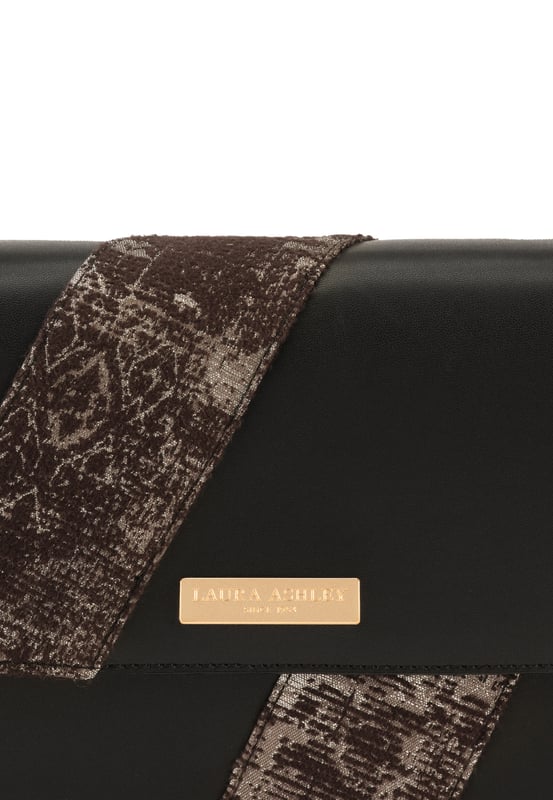 Lenght : 26 cm Height : 16 cm Width : 6 cm Handle Material  : Vegan Leather (pu) Handle Lenght : 50 cm  İnteriror Detail :  Lined Closure Type : Magnet Usage: Suitable for Daily & Formal Carrying on Shoulder and in Hand Material : A Quality Vegan Leather Lined Material : Polyester Lined Colour : Brown Accessory Material : Metal Fabric Type : Straight Compartments : One main compartment and One phone Pocket. Washing Instructions: Do not use chemical-containing cleaners on your product. You can clean the surface with a damp cloth.