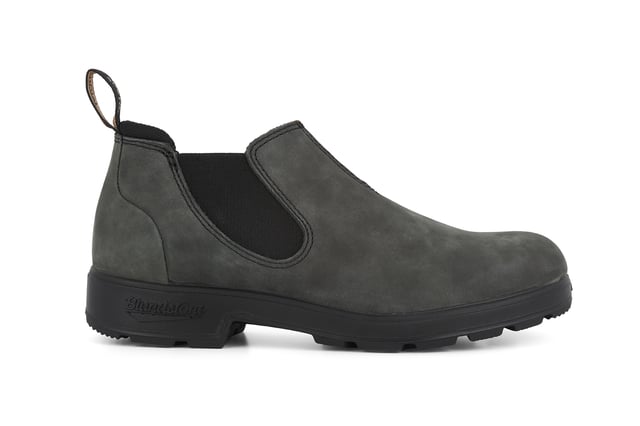 Building on the infallible Blundstone original series, the Blundstone 2035 offers the same great styling, comfort and practicality you can expect from the Blundstone original series in a new, iconic low cut design. Crafted with premium leather uppers in the Rustic black colour, the Blundstone 2035s maintain outstanding water resistance in a new and fresh design. With the special comfort cuff, these Blundstone are just as comfortable as its bigger brothers, and the ergonomically engineered toe spring combined with XRD® Technology in the heel further reduces wearer fatigue while increasing comfort. Additional leather heel protection and the durable TPU outsole ensure that this low-cut boot will last you many seasons to come. A versatile and stylish shoe, the Blundstone 2035 is a versatile shoe for those that want to look stylish on the go.  2.5mm thick premium black leather uppers Black elasticated sides and iconic pull tags for easy slip-on Padded collar for outstanding comfort Highly durable TPU outsole Cushioned midsole for all-day comfort Blundstone SPS Max Comfort system for superb shock absorption Removable footbed Lightweight for all-day everyday comfort