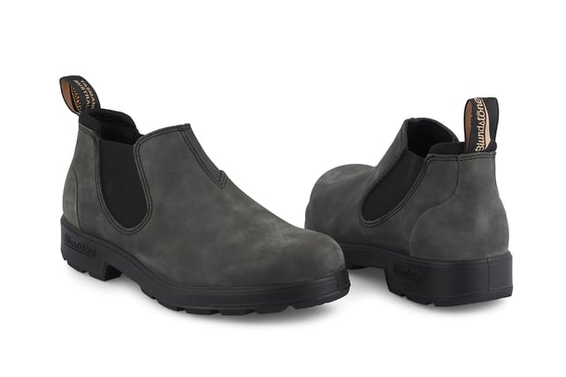 Building on the infallible Blundstone original series, the Blundstone 2035 offers the same great styling, comfort and practicality you can expect from the Blundstone original series in a new, iconic low cut design. Crafted with premium leather uppers in the Rustic black colour, the Blundstone 2035s maintain outstanding water resistance in a new and fresh design. With the special comfort cuff, these Blundstone are just as comfortable as its bigger brothers, and the ergonomically engineered toe spring combined with XRD® Technology in the heel further reduces wearer fatigue while increasing comfort. Additional leather heel protection and the durable TPU outsole ensure that this low-cut boot will last you many seasons to come. A versatile and stylish shoe, the Blundstone 2035 is a versatile shoe for those that want to look stylish on the go.  2.5mm thick premium black leather uppers Black elasticated sides and iconic pull tags for easy slip-on Padded collar for outstanding comfort Highly durable TPU outsole Cushioned midsole for all-day comfort Blundstone SPS Max Comfort system for superb shock absorption Removable footbed Lightweight for all-day everyday comfort