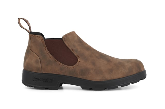Building on the infallible Blundstone original series, the Blundstone 2036 offers the same great styling, comfort and practicality you can expect from the Blundstone original series in a new, iconic low cut design. Crafted with premium leather uppers in the ever-popular rustic brown colour, the Blundstone 2036 maintain outstanding water resistance in a new and fresh design. With the special comfort cuff, these Blundstone are just as comfortable as its bigger brothers, and the ergonomically engineered toe spring combined with XRD® Technology in the heel further reduces wearer fatigue while increasing comfort. Additional leather heel protection and the durable TPU outsole ensure that this low-cut boot will last you many seasons to come. A versatile and stylish shoe, the Blundstone 2036 are the perfect transeasonal shoe for wherever life takes you.  2.5mm thick premium rustic brown leather uppers Brown elasticated sides and iconic pull tags for easy slip-on Padded collar for outstanding comfort Highly durable TPU outsole Cushioned midsole for all-day comfort Blundstone SPS Max Comfort system for superb shock absorption Removable footbed Lightweight for all-day everyday comfort