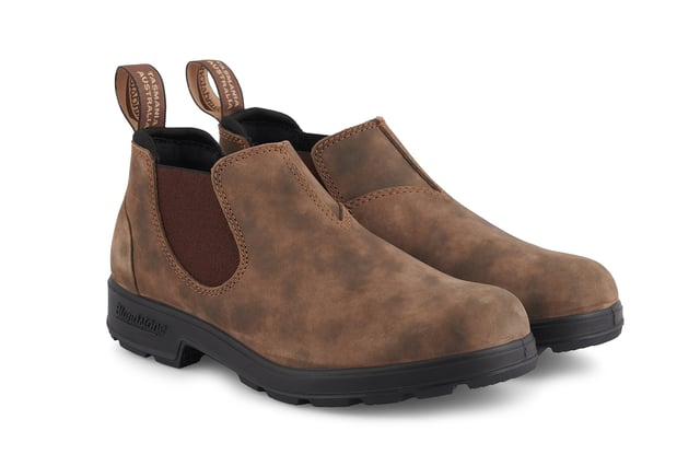 Building on the infallible Blundstone original series, the Blundstone 2036 offers the same great styling, comfort and practicality you can expect from the Blundstone original series in a new, iconic low cut design. Crafted with premium leather uppers in the ever-popular rustic brown colour, the Blundstone 2036 maintain outstanding water resistance in a new and fresh design. With the special comfort cuff, these Blundstone are just as comfortable as its bigger brothers, and the ergonomically engineered toe spring combined with XRD® Technology in the heel further reduces wearer fatigue while increasing comfort. Additional leather heel protection and the durable TPU outsole ensure that this low-cut boot will last you many seasons to come. A versatile and stylish shoe, the Blundstone 2036 are the perfect transeasonal shoe for wherever life takes you.  2.5mm thick premium rustic brown leather uppers Brown elasticated sides and iconic pull tags for easy slip-on Padded collar for outstanding comfort Highly durable TPU outsole Cushioned midsole for all-day comfort Blundstone SPS Max Comfort system for superb shock absorption Removable footbed Lightweight for all-day everyday comfort