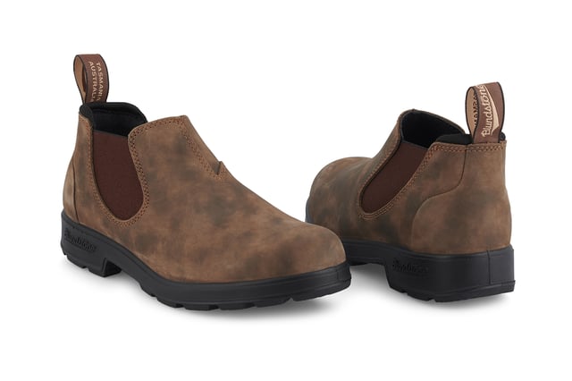 Building on the infallible Blundstone original series, the Blundstone 2036 offers the same great styling, comfort and practicality you can expect from the Blundstone original series in a new, iconic low cut design. Crafted with premium leather uppers in the ever-popular rustic brown colour, the Blundstone 2036 maintain outstanding water resistance in a new and fresh design. With the special comfort cuff, these Blundstone are just as comfortable as its bigger brothers, and the ergonomically engineered toe spring combined with XRD® Technology in the heel further reduces wearer fatigue while increasing comfort. Additional leather heel protection and the durable TPU outsole ensure that this low-cut boot will last you many seasons to come. A versatile and stylish shoe, the Blundstone 2036 are the perfect transeasonal shoe for wherever life takes you.  2.5mm thick premium rustic brown leather uppers Brown elasticated sides and iconic pull tags for easy slip-on Padded collar for outstanding comfort Highly durable TPU outsole Cushioned midsole for all-day comfort Blundstone SPS Max Comfort system for superb shock absorption Removable footbed Lightweight for all-day everyday comfort
