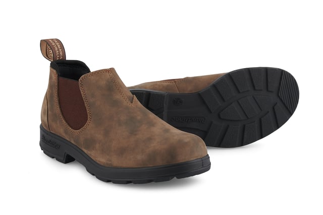 Building on the infallible Blundstone original series, the Blundstone 2036 offers the same great styling, comfort and practicality you can expect from the Blundstone original series in a new, iconic low cut design. Crafted with premium leather uppers in the ever-popular rustic brown colour, the Blundstone 2036 maintain outstanding water resistance in a new and fresh design. With the special comfort cuff, these Blundstone are just as comfortable as its bigger brothers, and the ergonomically engineered toe spring combined with XRD® Technology in the heel further reduces wearer fatigue while increasing comfort. Additional leather heel protection and the durable TPU outsole ensure that this low-cut boot will last you many seasons to come. A versatile and stylish shoe, the Blundstone 2036 are the perfect transeasonal shoe for wherever life takes you.  2.5mm thick premium rustic brown leather uppers Brown elasticated sides and iconic pull tags for easy slip-on Padded collar for outstanding comfort Highly durable TPU outsole Cushioned midsole for all-day comfort Blundstone SPS Max Comfort system for superb shock absorption Removable footbed Lightweight for all-day everyday comfort