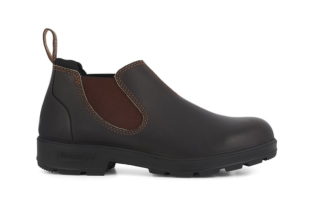 Building on the infallible Blundstone original series, the Blundstone 2038 offers the same great styling, comfort and practicality you can expect from the Blundstone original series in a new, iconic low cut design. Crafted with premium leather uppers in the brown colour, the Blundstone 2038s maintain outstanding water resistance in a new and fresh design. With the special comfort cuff, these Blundstone are just as comfortable as its bigger brothers, and the ergonomically engineered toe spring combined with XRD® Technology in the heel further reduces wearer fatigue while increasing comfort. Additional leather heel protection and the durable TPU outsole ensure that this low-cut boot will last you many seasons to come. A versatile and stylish shoe, the Blundstone 2038 is a versatile shoe for those that want to look stylish on the go.  2.5mm thick premium black leather uppers Black elasticated sides and iconic pull tags for easy slip-on Padded collar for outstanding comfort Highly durable TPU outsole Cushioned midsole for all-day comfort Blundstone SPS Max Comfort system for superb shock absorption Removable footbed Lightweight for all-day everyday comfort