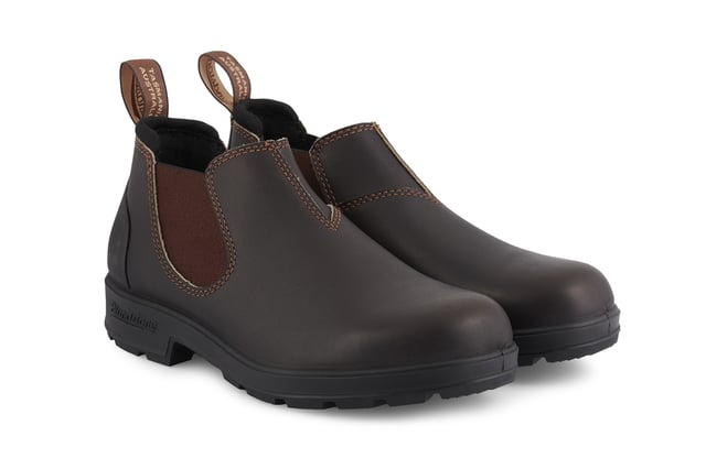 Building on the infallible Blundstone original series, the Blundstone 2038 offers the same great styling, comfort and practicality you can expect from the Blundstone original series in a new, iconic low cut design. Crafted with premium leather uppers in the brown colour, the Blundstone 2038s maintain outstanding water resistance in a new and fresh design. With the special comfort cuff, these Blundstone are just as comfortable as its bigger brothers, and the ergonomically engineered toe spring combined with XRD® Technology in the heel further reduces wearer fatigue while increasing comfort. Additional leather heel protection and the durable TPU outsole ensure that this low-cut boot will last you many seasons to come. A versatile and stylish shoe, the Blundstone 2038 is a versatile shoe for those that want to look stylish on the go.  2.5mm thick premium black leather uppers Black elasticated sides and iconic pull tags for easy slip-on Padded collar for outstanding comfort Highly durable TPU outsole Cushioned midsole for all-day comfort Blundstone SPS Max Comfort system for superb shock absorption Removable footbed Lightweight for all-day everyday comfort