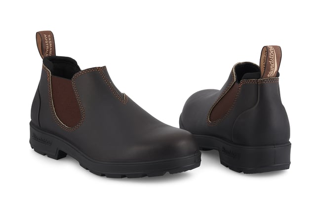 Building on the infallible Blundstone original series, the Blundstone 2038 offers the same great styling, comfort and practicality you can expect from the Blundstone original series in a new, iconic low cut design. Crafted with premium leather uppers in the brown colour, the Blundstone 2038s maintain outstanding water resistance in a new and fresh design. With the special comfort cuff, these Blundstone are just as comfortable as its bigger brothers, and the ergonomically engineered toe spring combined with XRD® Technology in the heel further reduces wearer fatigue while increasing comfort. Additional leather heel protection and the durable TPU outsole ensure that this low-cut boot will last you many seasons to come. A versatile and stylish shoe, the Blundstone 2038 is a versatile shoe for those that want to look stylish on the go.  2.5mm thick premium black leather uppers Black elasticated sides and iconic pull tags for easy slip-on Padded collar for outstanding comfort Highly durable TPU outsole Cushioned midsole for all-day comfort Blundstone SPS Max Comfort system for superb shock absorption Removable footbed Lightweight for all-day everyday comfort