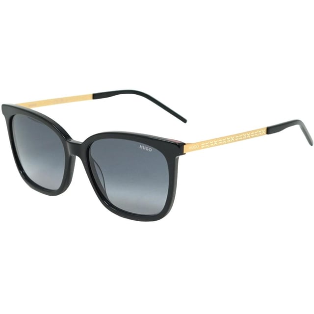 Hugo Boss HG1080/S CR GY 807 Schwarze Sonnenbrille. Machen Sie den Neid Ihrer Freunde und Kollegen mit der schwarzen Sonnenbrille von Hugo Boss! Diese stilvolle Sonnenbrille bietet einen klassischen und doch modernen Look, der jedem Outfit einen Hauch von Raffinesse verleiht. Die schwarze Sonnenbrille von Hugo Boss bietet verbesserte Haltbarkeit und maximalen Komfort. Holen Sie sich einen coolen, selbstbewussten Look mit der schwarzen Sonnenbrille von Hugo Boss! Schwarze Sonnenbrille von Hugo Boss, Linsenbreite = 54 mm, Nasenstegbreite = 13 mm, Bügellänge = 135 mm. Sonnenbrillenetui mit Markenlogo und Reinigungstuch im Lieferumfang enthalten. 100 % Schutz vor UVA- und UVB-Sonnenlicht und entspricht der britischen Norm EN 1836:2005. Hugo Boss HG1080/S CR GY 807 Schwarze Sonnenbrille