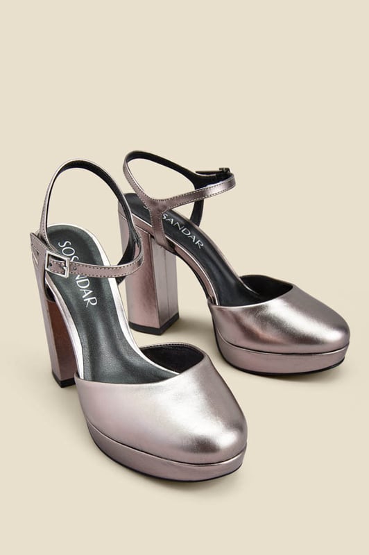 Platforms are back
You won't believe how comfy they are
Luxe metallic leather - they're made for dancing
Closed toe means no pedi needed
Style with a silky blouse and flared jeans
Pair with a dress for weddings and parties