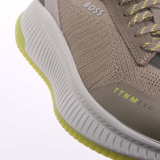 rafted in a combination of materials  including leather trims  these running-style BOSS Menswear trainers strike a distinctive profile. Lightweight ridged outsole. Knitted uppers for enhanced comfort and fit. This product contains at least 60% better raw materials. This product is partly created with recycled polyester. We at HUGO BOSS prefer recycled polyester from pre- and post-consumer textile waste and do our best to phase out polyester from PET bottles.