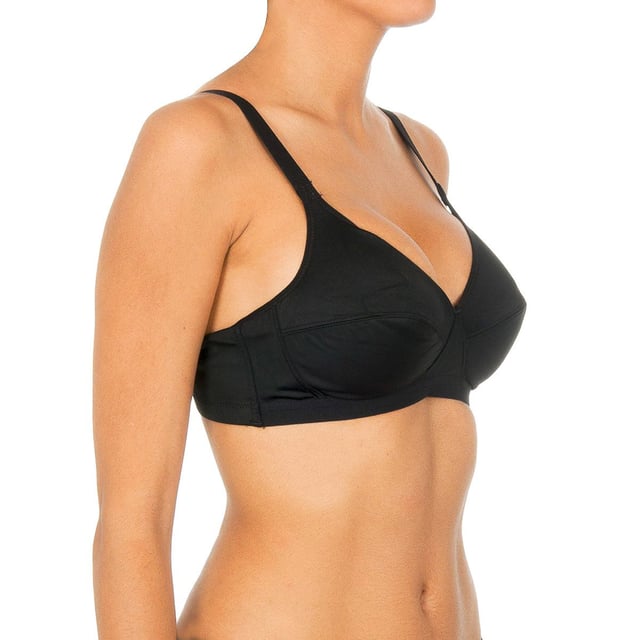 Wireless bra.
 Cups without foam.
 Elastic and adjustable straps.
 Excellent support for an impeccable silhouette.
 Back closure with four-position hooks.
 Elastic sides.
 Seams seen in tone.
 Composition: 77% Polyamide, 23% Elastane
 Care:
Care:
 - Handwash.
 - Do not use bleach.
 - Do not use dryer.
 - Do not iron.
 - Do not dry clean.